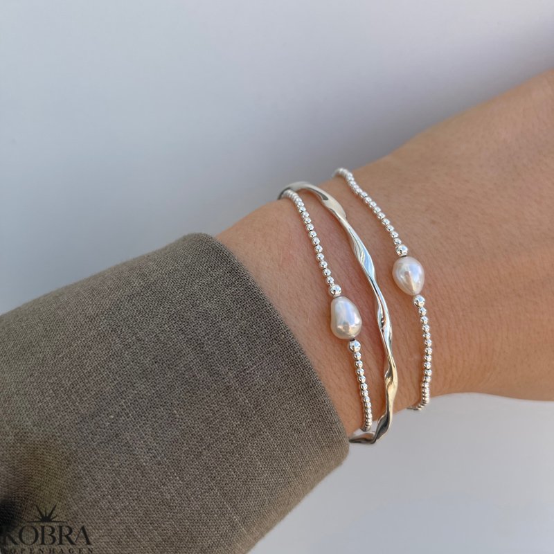 "Esmeralda" snoet armring i sterling sølv