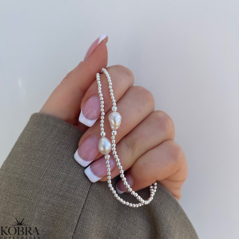 "Dixie" slv armbnd med slvkugler og ferskvandsperle