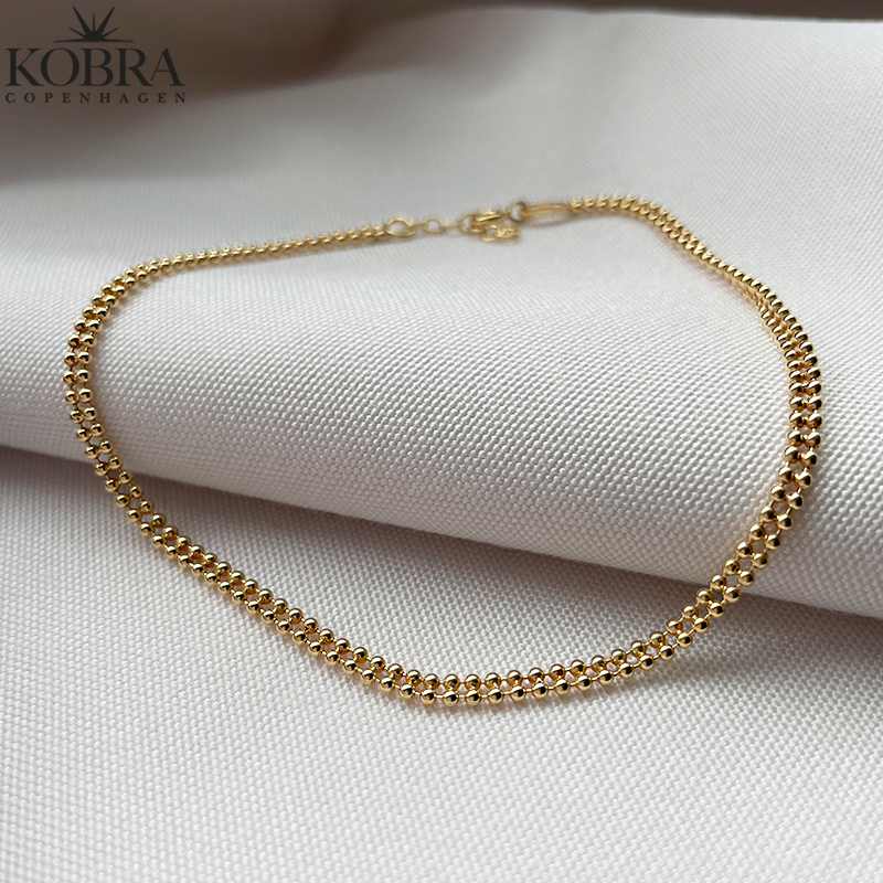 "Smilla" ankelkde med dobbelt guldkugler