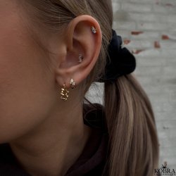 "Curly" twisted guld reringe / restikker