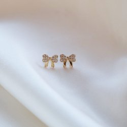 "Elsa" gold earrings with small bows and white stones