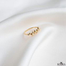 "Veronica" smuk guld ring med guldkugler og hvide sten