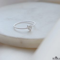 "Tillies" silver ring with drop-shaped white stone