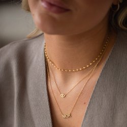 "MOR" guld halsk�de med sten