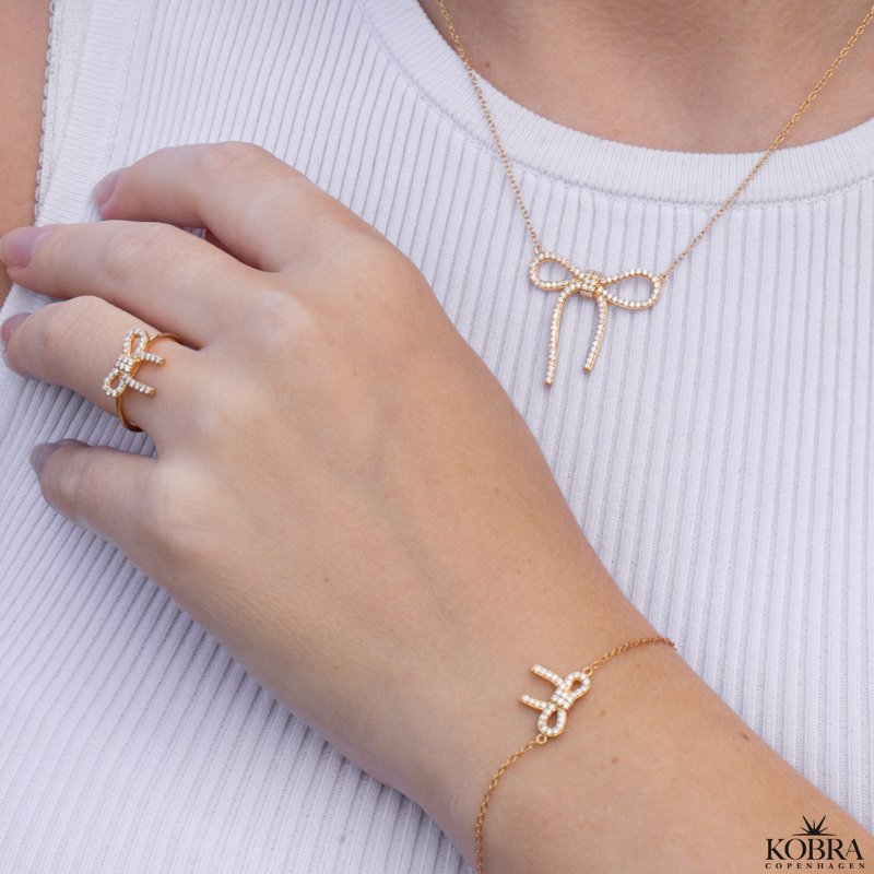 "Leonora" 18 carat gold-plated bow bracelet with white zirconia