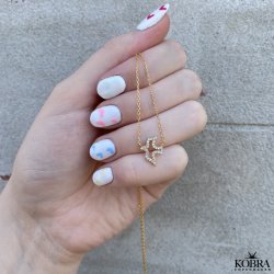 "Falcon" guld halskde med lille Svale