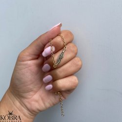  "Merle" gold ankle chain with small feathers