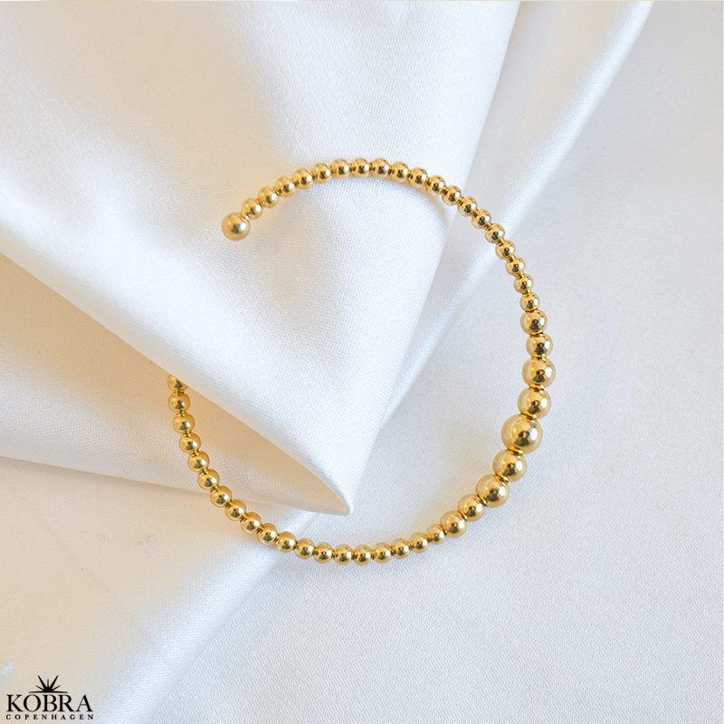 "Mella" guldarmband / cuff med guldkulor