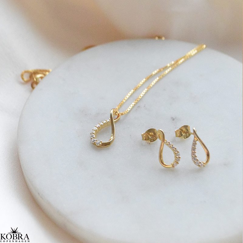 "Infinity Drop"  elegante reringe i 18k forgyldt slv