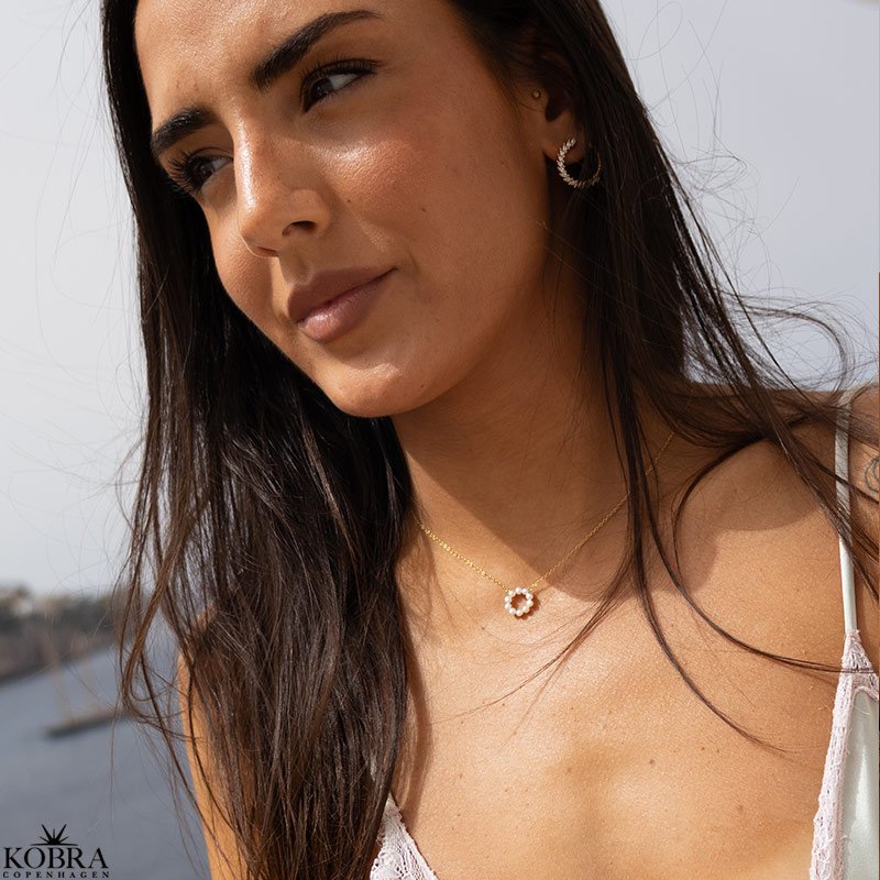 "Gabriella" gold earrings with round and oval white stones