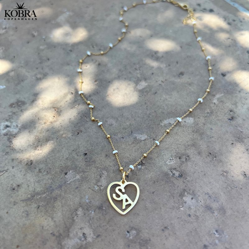 "Alba" ball necklace with colored enamel balls in gilt