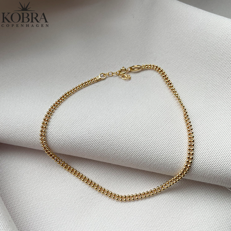 "Smilla" ankelkde med dobbelt guldkugler