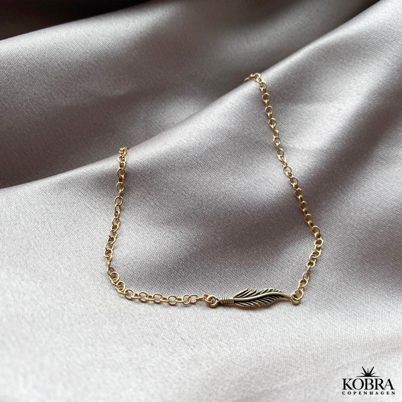  "Merle" gold ankle chain with small feathers