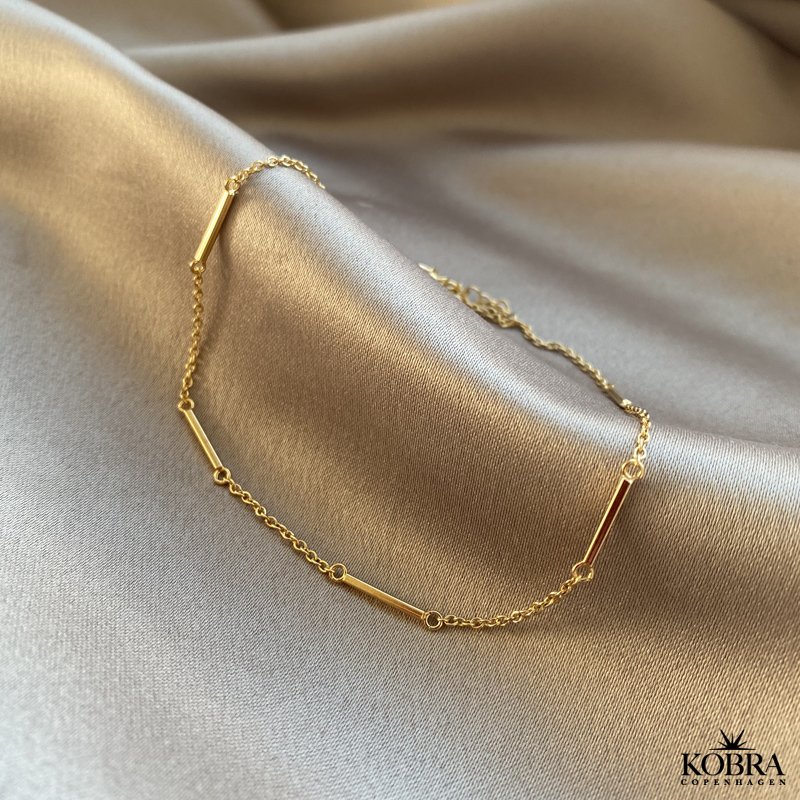 "Holly" forgyldt ankelkde