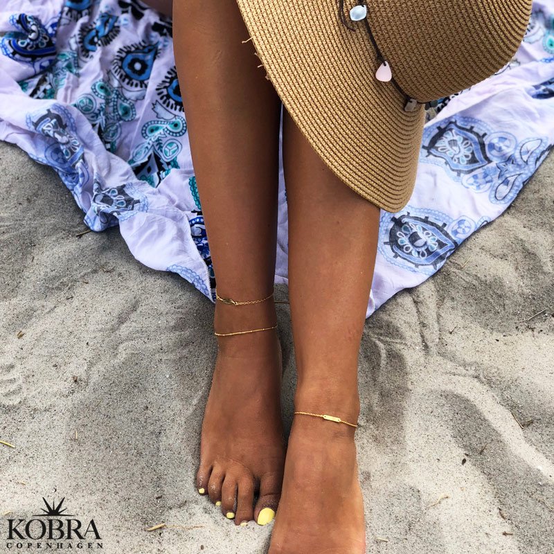  "Merle" gold ankle chain with small feathers