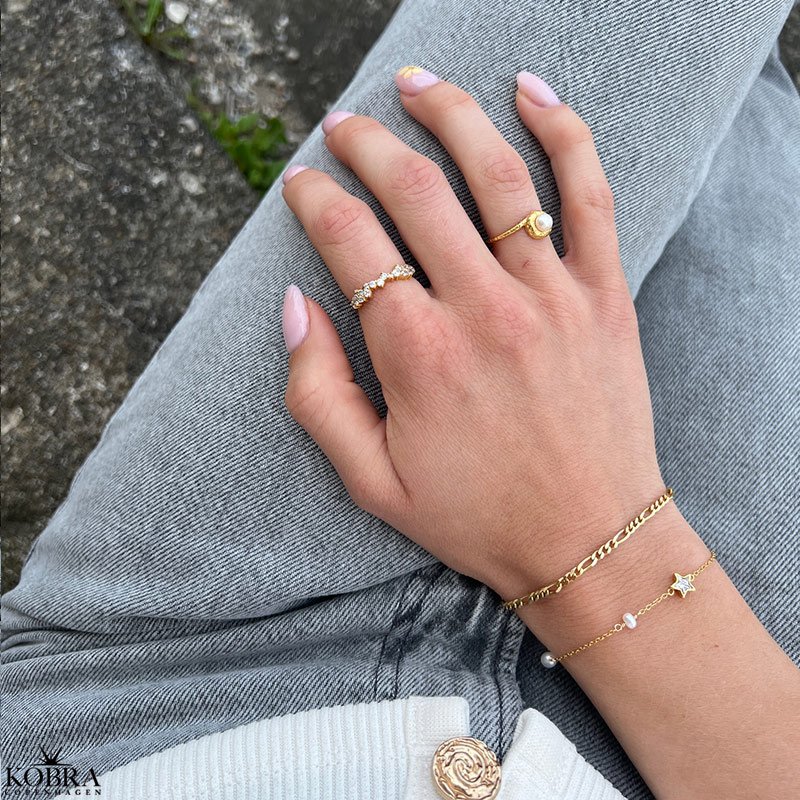 "Mikami" 18 carat gold plated ring with white stones