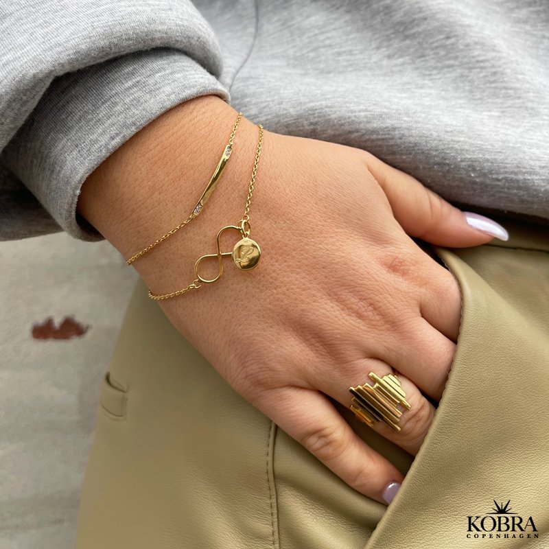 Infinity - goldplated bracelet with infinity sign and small ID tag incl. personal engraving