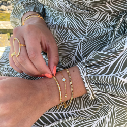 "Jenny" guld armbnd med hvide sten