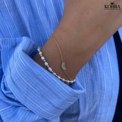 "Royal" perle armbnd med guld kugler