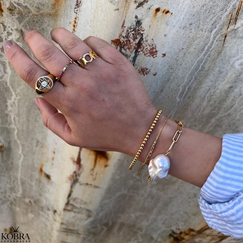"Sarasota" guld armbnd med stor ferskvandsperle
