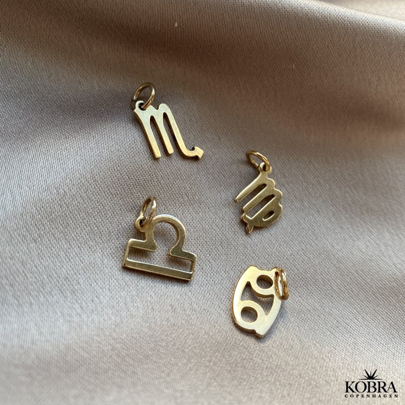 "Hoshi" hndlavet stjernetegns charm i guld