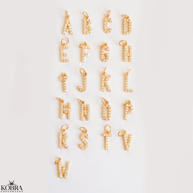 "Alias" gold necklace with your letter