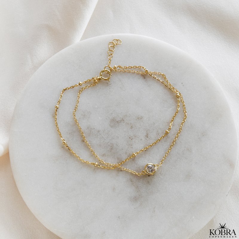 "Elara" guld armbnd med dobbeltkder