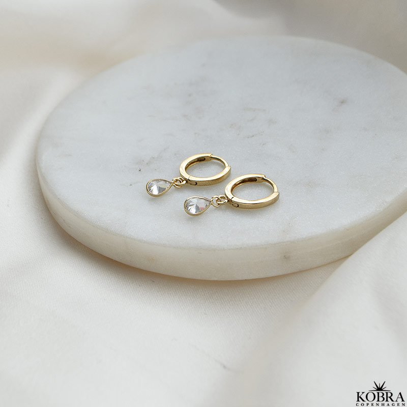 "Teardrop" 18 karat forgyldte hoops med hvide drbesten