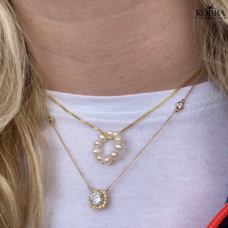 "Sylvie" guld halskde med hvide zirkonia sten
