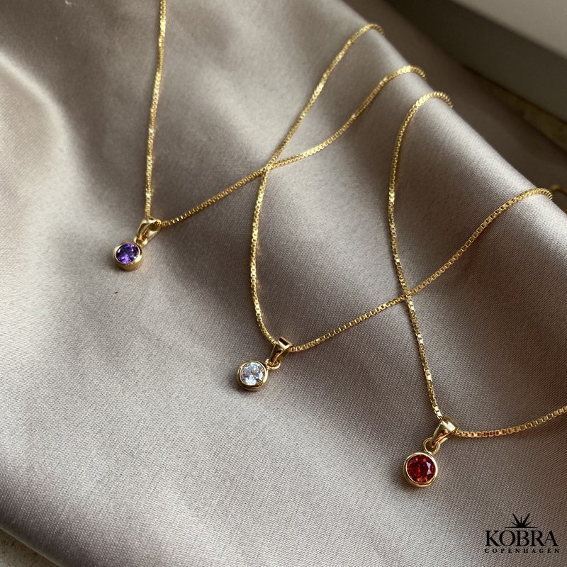 Birthstone charm in gold