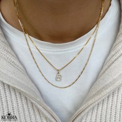 "Zoey" bogstav halskęde i guld med hvide sten