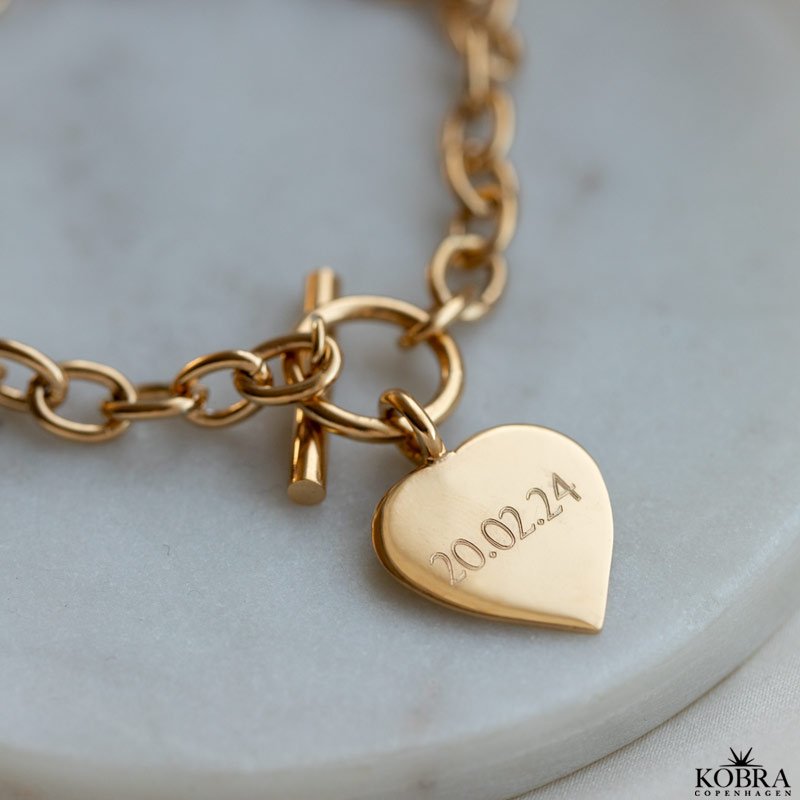 "So Loved" chunky gold bracelet with gold heart