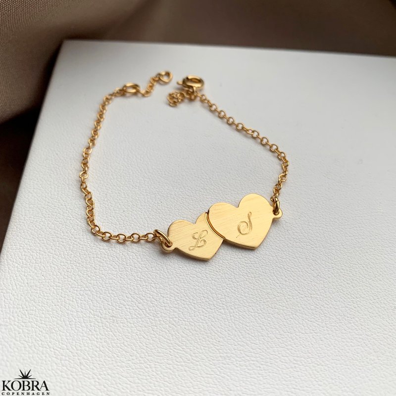"Mila" 18 carat gold plated bracelet with gold hearts and your personal engraving