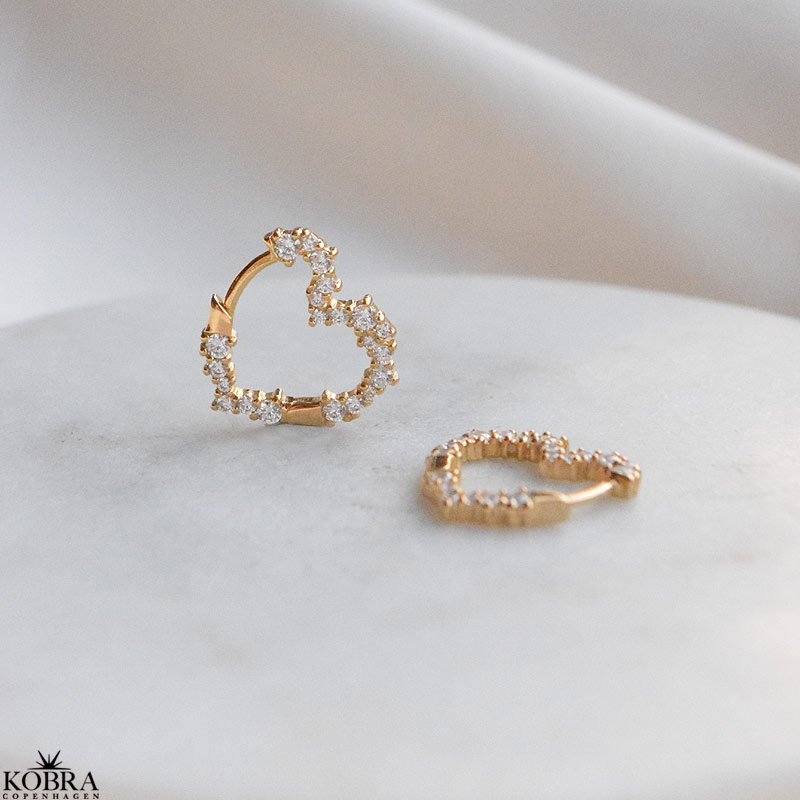 "Mikami" small gold heart earrings with white stones