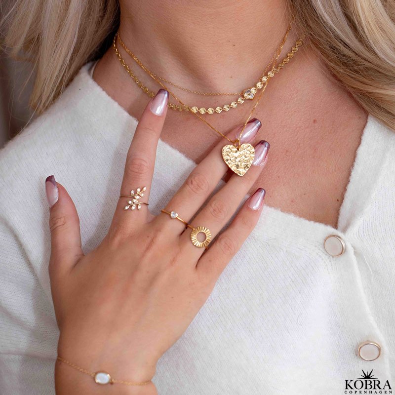 "SOL" gold necklace with small suns