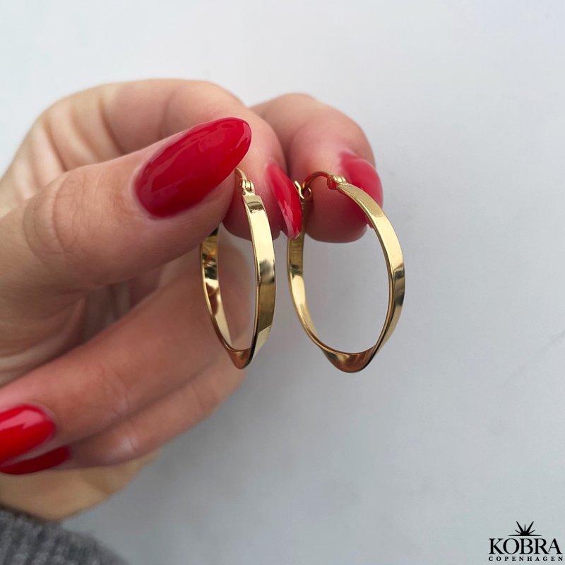 "Emilie" 18 carat gold plated hoops with a twist