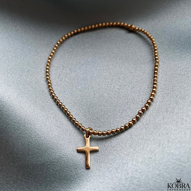 "Free" classic 18 carat gold plated cross bracelet
