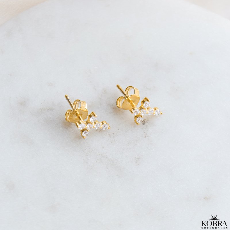 "Kaia" guld kors restik med sten 