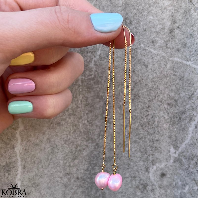 "Pina" guld reringe med lyserde perler 