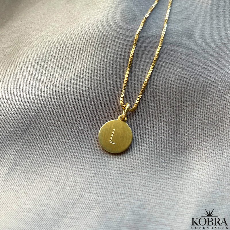 Mini ID tag / amulet i guld inklusiv din personlige gravering