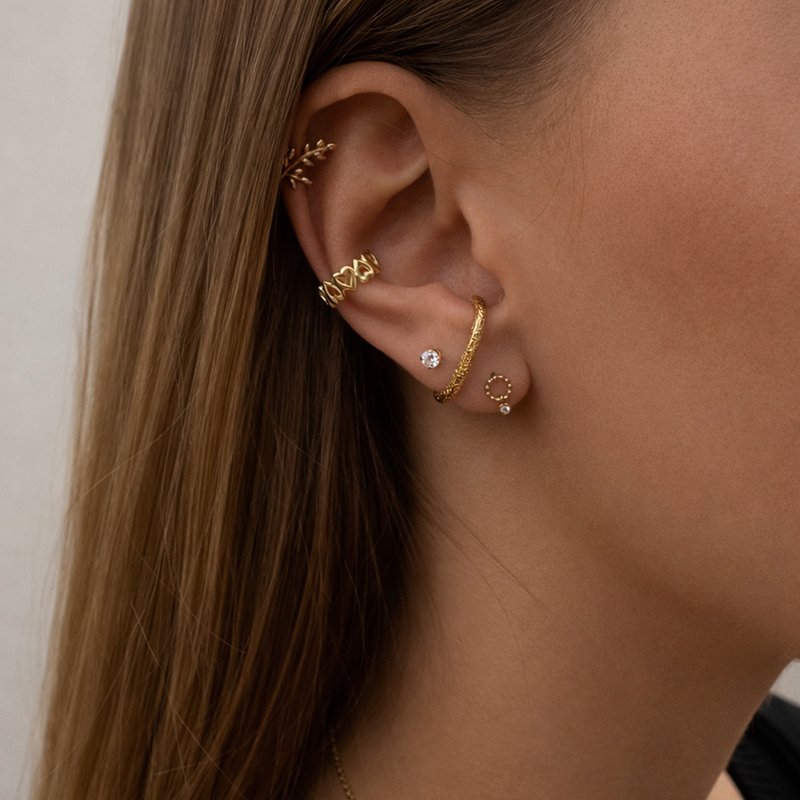 "Love" earcuff with heart design in 18k gold-plated sterling silver.