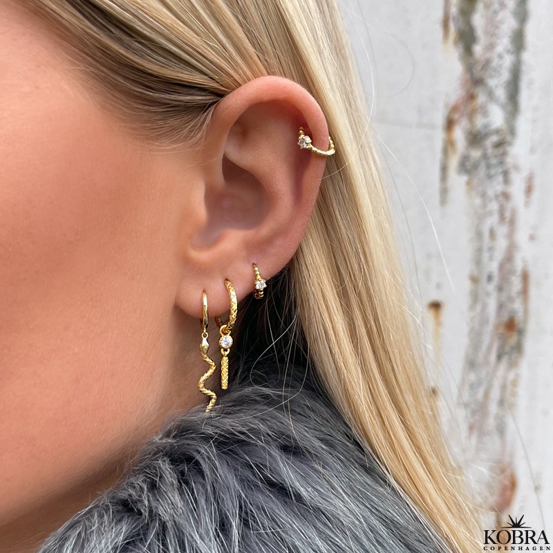 "Pippi" guld "slange" reringe med hvide sten