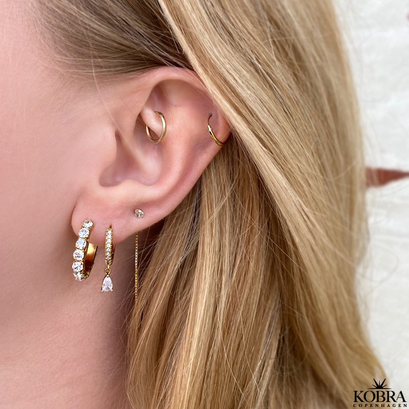 "Lisa" rehnger med hvid sten i 18 karat forgyldt