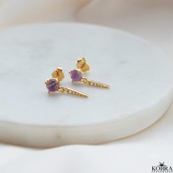 "Cilja" guld reringe med lilla sten