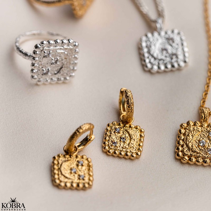 "Moondust" 18k gold-plated earrings with moons and stars