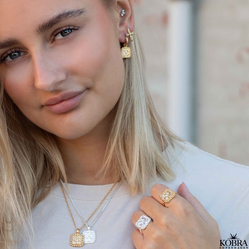 "Moondust" gold ring with moons and stars