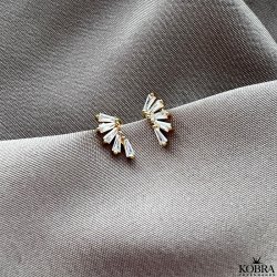 "Nia" guld reringe med hvide sten