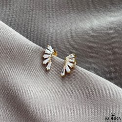 "Nia" guld reringe med hvide sten