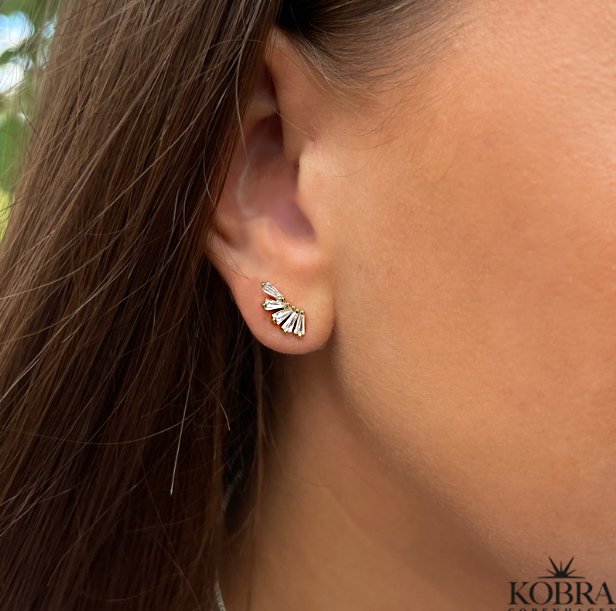 "Nia" guld reringe med hvide sten