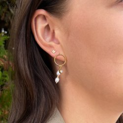 "Cheryl" guld reringe med ferskvandsperler samt zirkonia sten